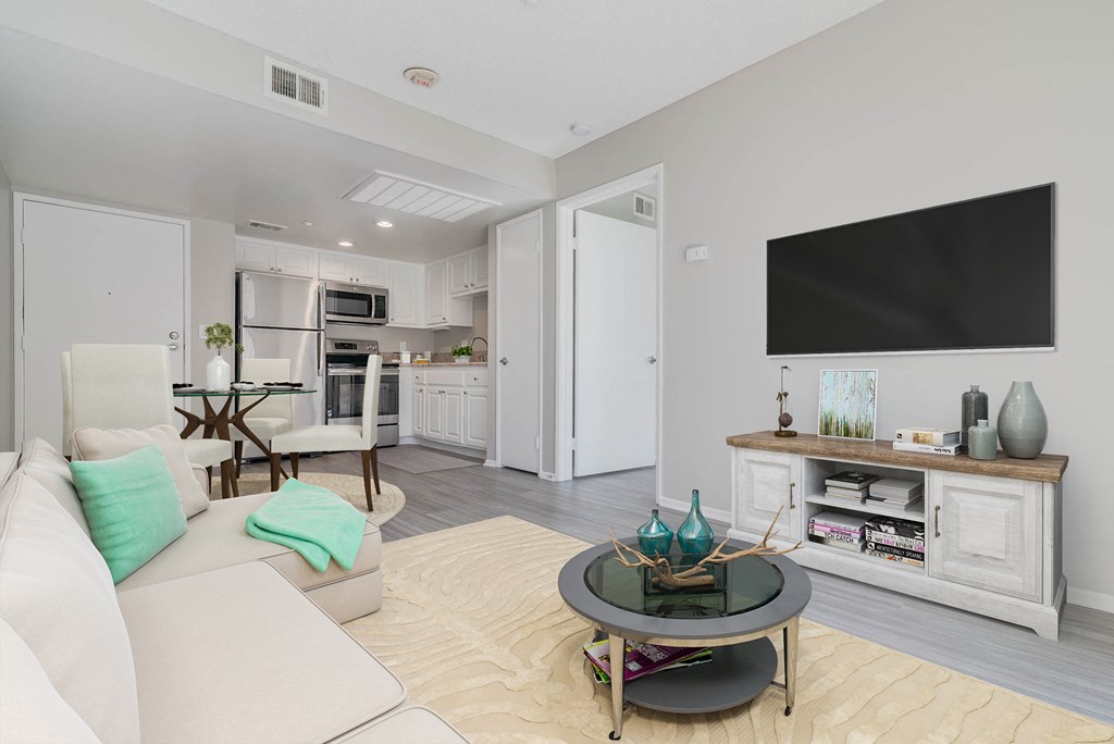 a living room with a couch and a table