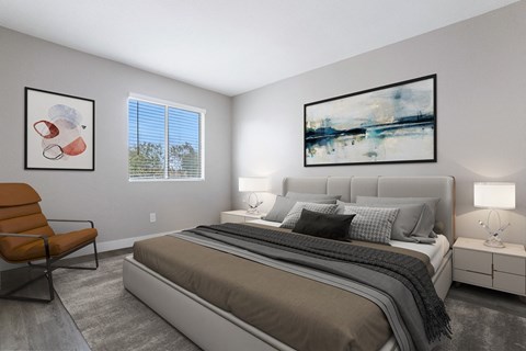 a bedroom with a bed and a chair and a window