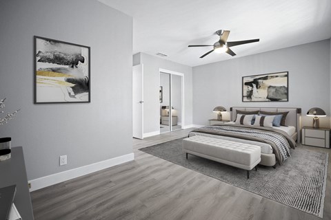 a bedroom with a bed and a ceiling fan