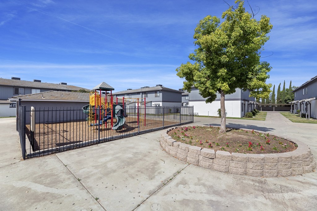 a playground at the whispering winds apartments in pearland, tx