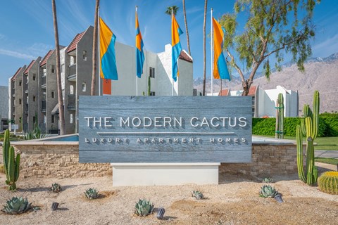 the modern cactus luxury apartment homes entrance sign