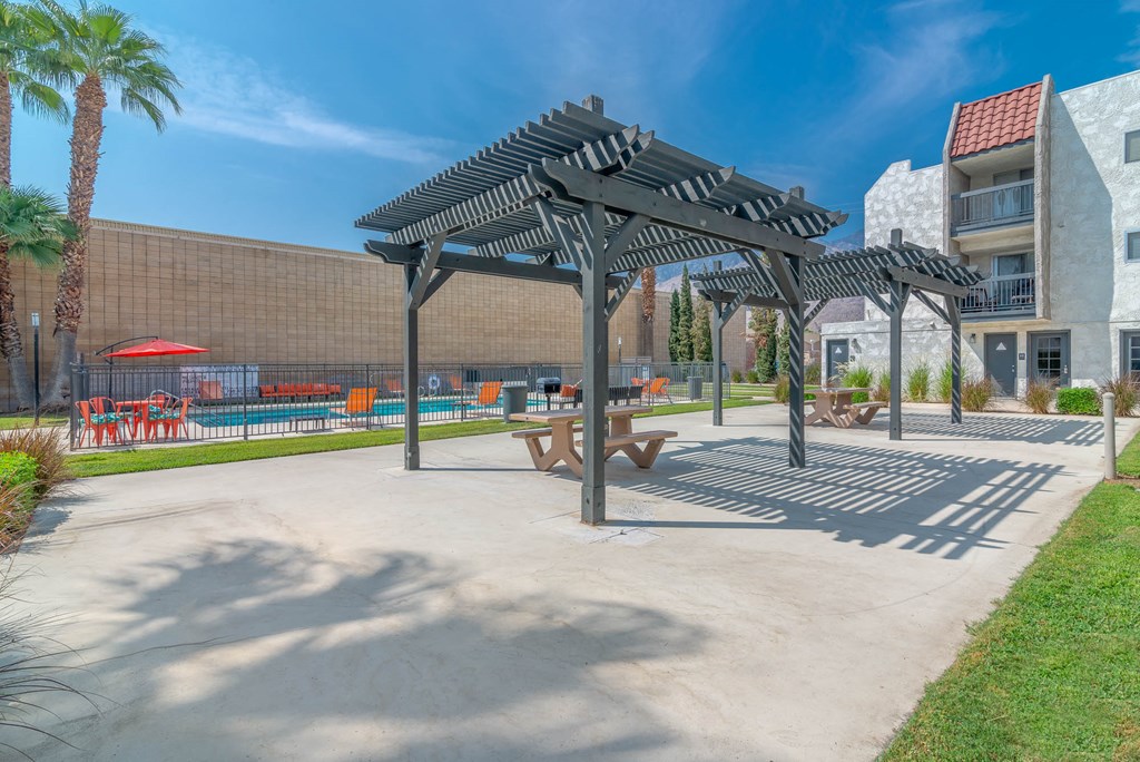 our apartments have a picnic area with awnings and a pool