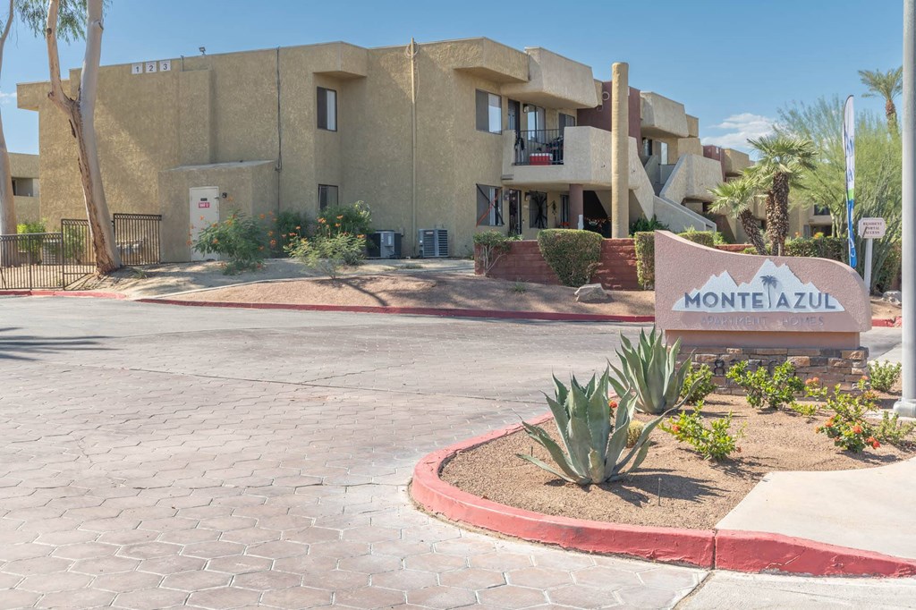 a building with a sign for montezuma apartments