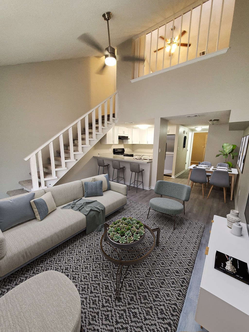 a view of the living room and kitchen from the loft