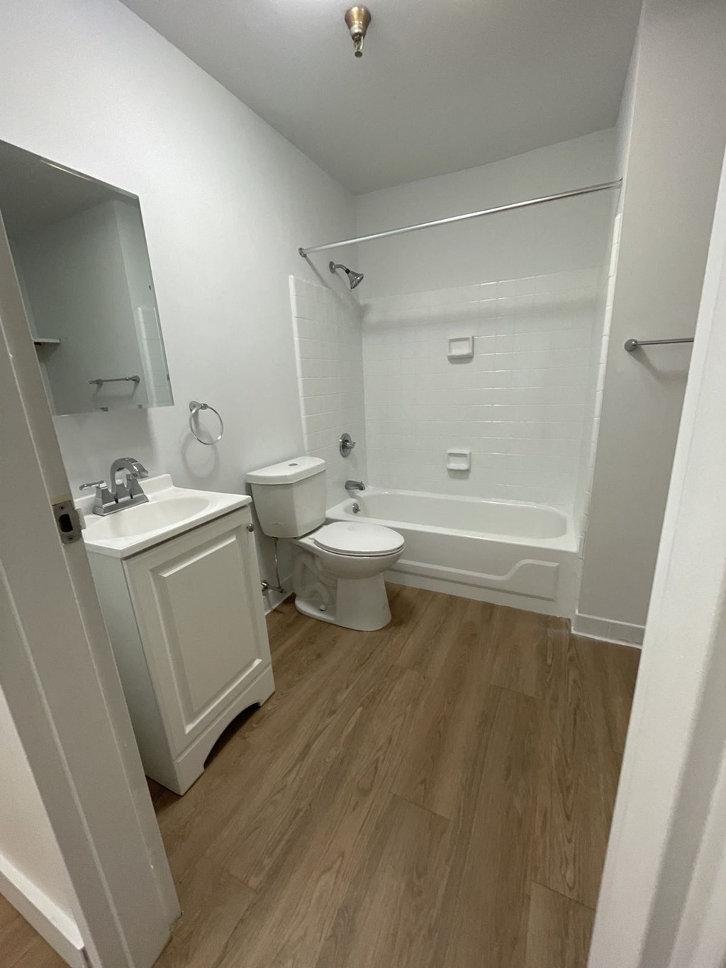 a bathroom with a toilet sink and bathtub