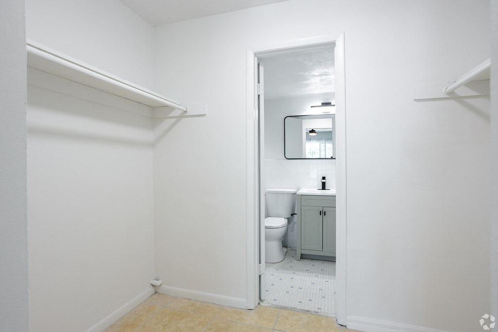 a bathroom with a toilet and a sink
