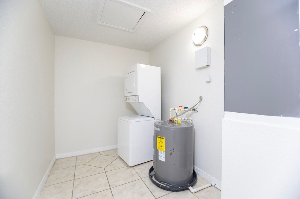 a laundry room with a washer and dryer