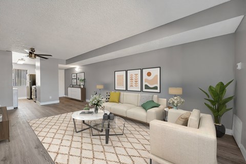 an open living room with a couch and a coffee table