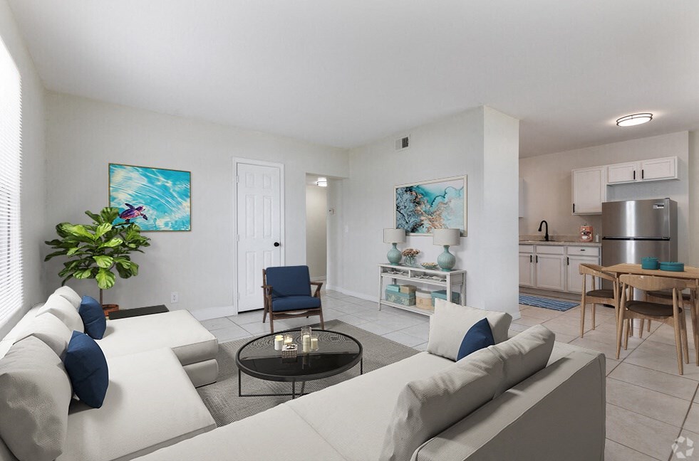 a living room with white couches and a glass coffee table