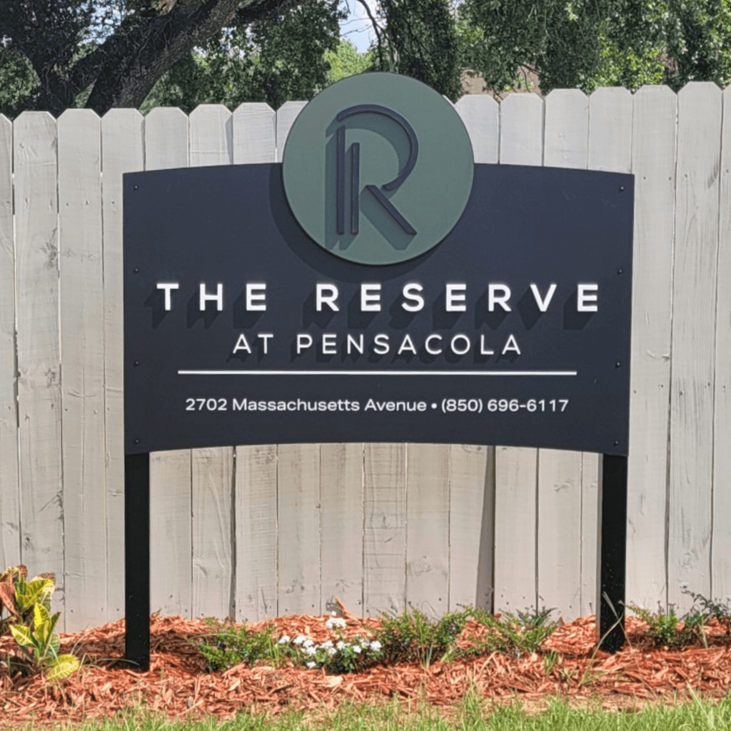 the sign at the entrance to the preserve at pensacola