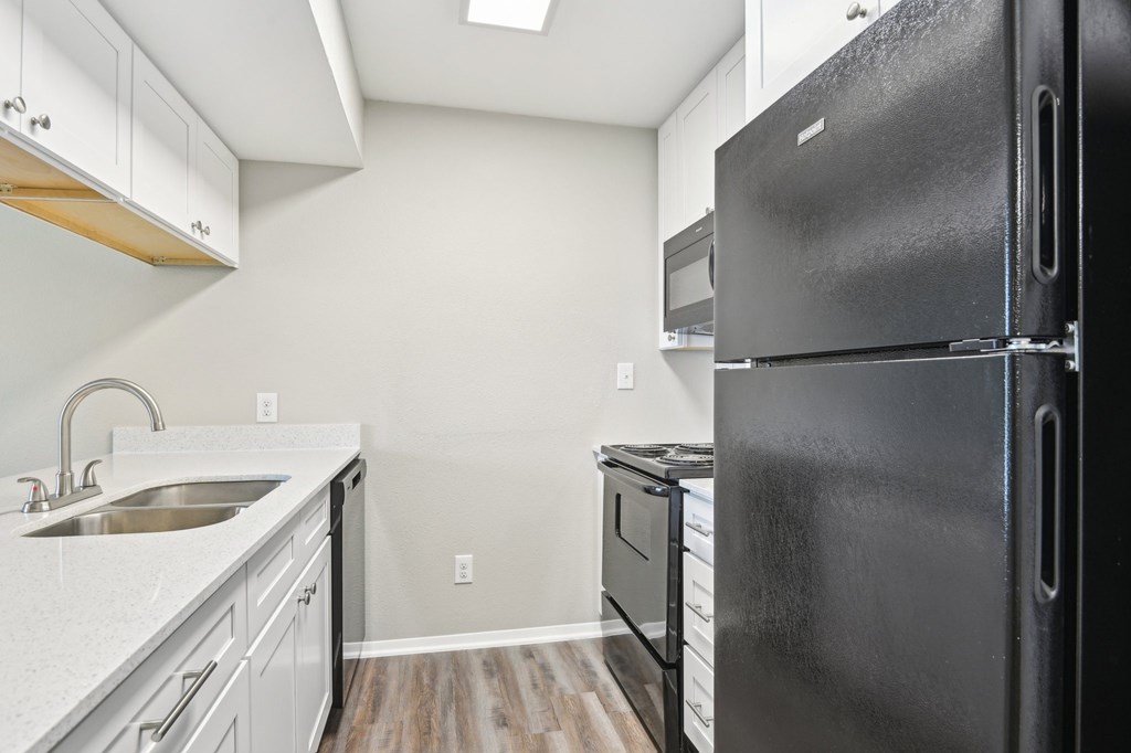 Kitchen Fridge at Abbey Glenn Apartments, Texas