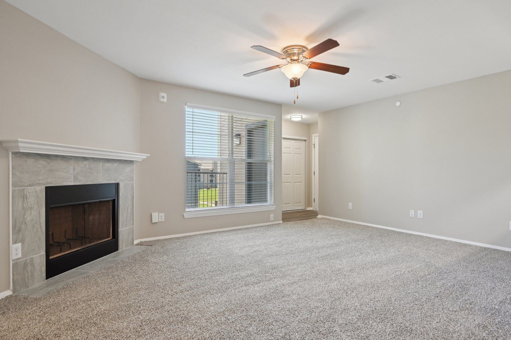 Living Area With Fireplace at Abbey Glenn Apartments, Waco
