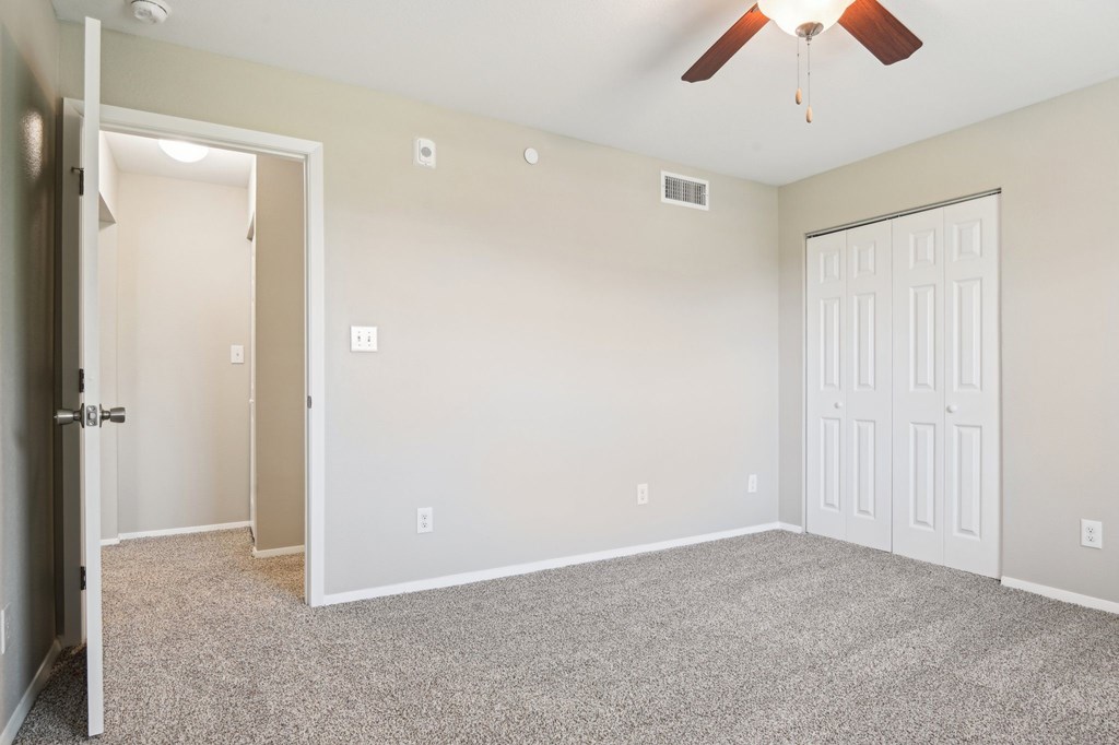 Bedroom With Carpet at Abbey Glenn Apartments, Waco, Texas
