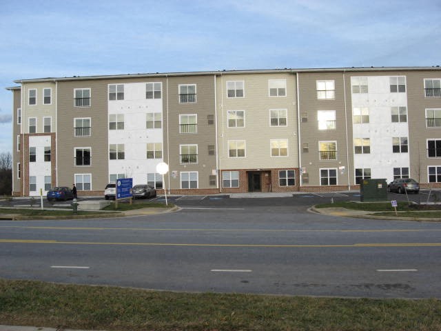 a tan and white building with many windows  at Rosewood Village, Hagerstown, Maryland