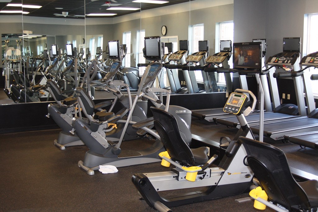 a gym full of cardio machines and other exercise equipment  at Rosewood Village, Hagerstown, MD, 21742