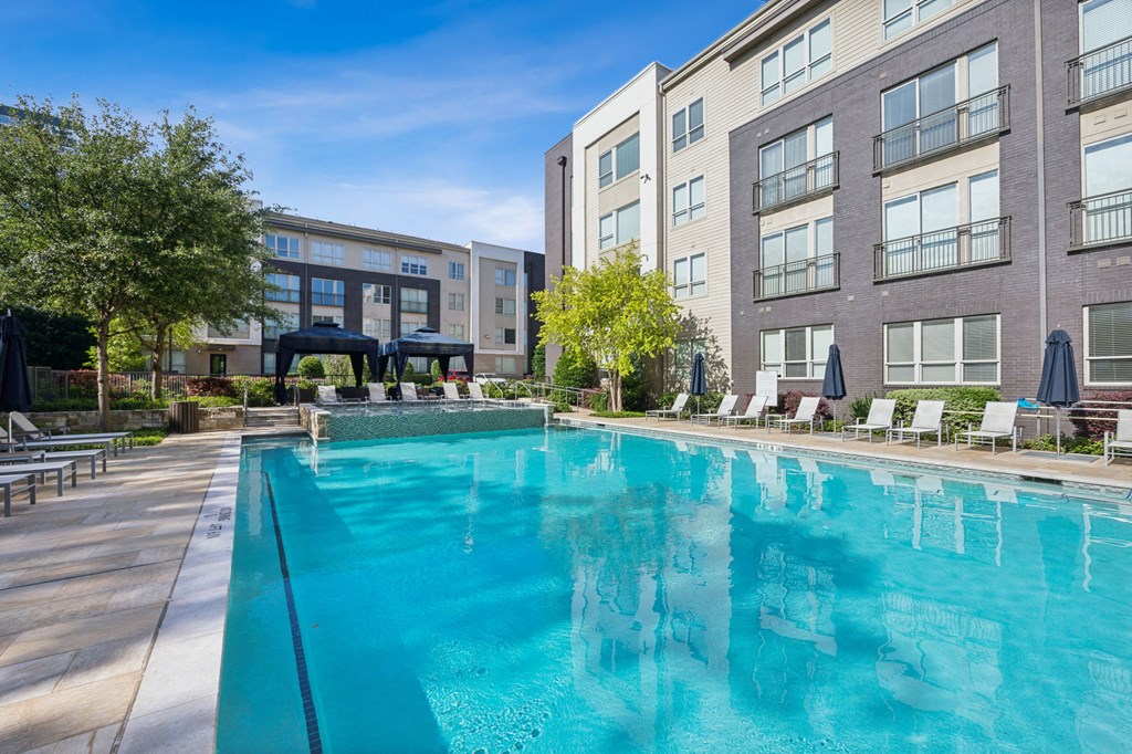 the swimming pool and the ceiling of a swimming pool with blue water