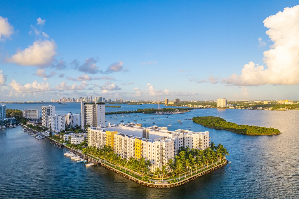 an aerial view of a body of water with buildings and a harbor