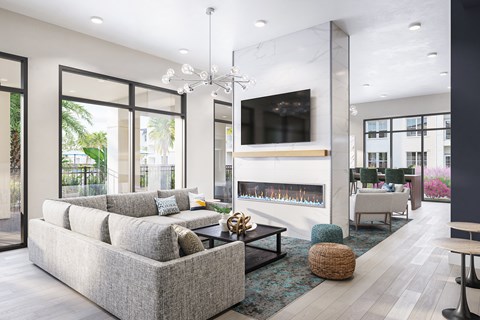 a living room with a couch and a fireplace