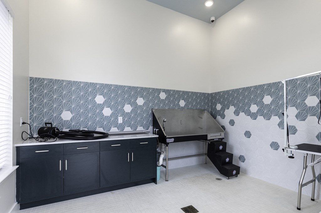a kitchen with a stove and a sink