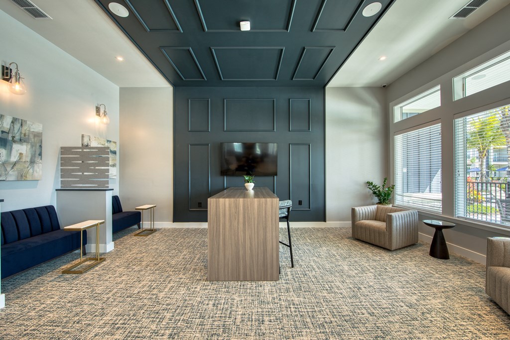 a living room with a tv and a table