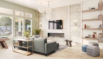 a living room filled with furniture and a fireplace