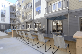Outdoor Grilling and Lounge Area at Walcott Jeffersonville Apartments
