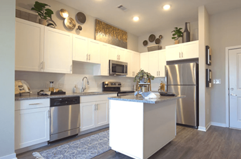 Fully Equipped Kitchen with Stainless Steel Appliances at Walcott Jeffersonville Apartments