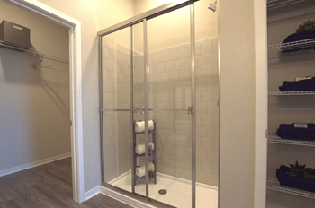 Walk In Showers with Glass Sliding Doors at Walcott Jeffersonville Apartments