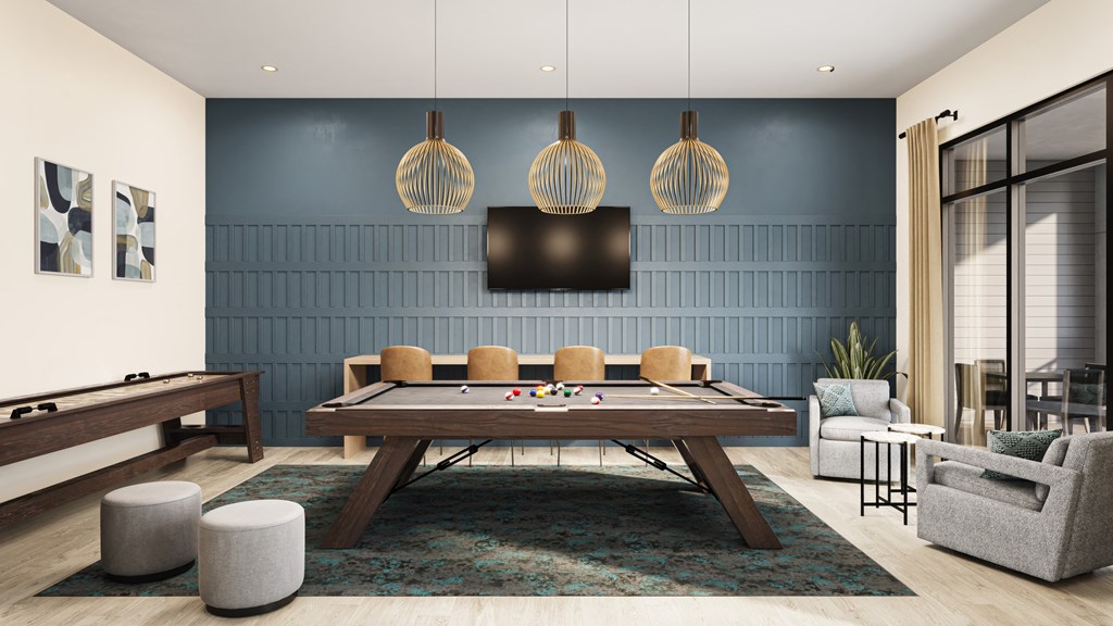 a living room with a pool table and a tv