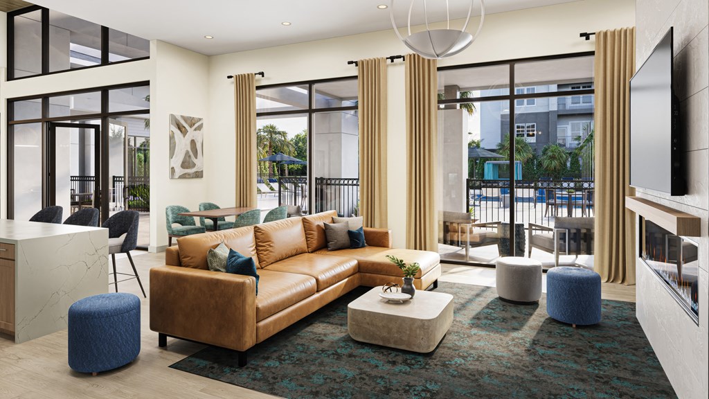 a living room with a leather couch and a coffee table