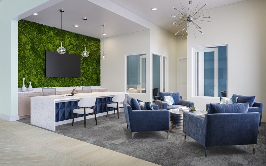 a living room with blue and white furniture and a green wall