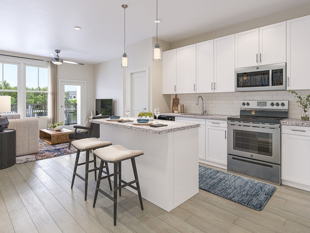 a kitchen and living room with an island and bar stools