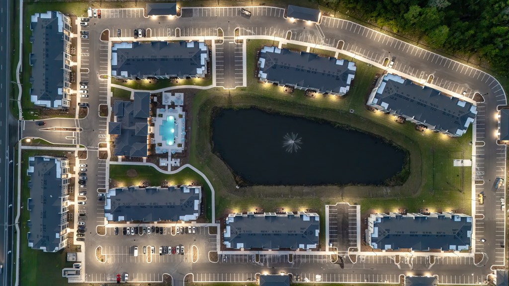 A large complex with a lake in the middle.