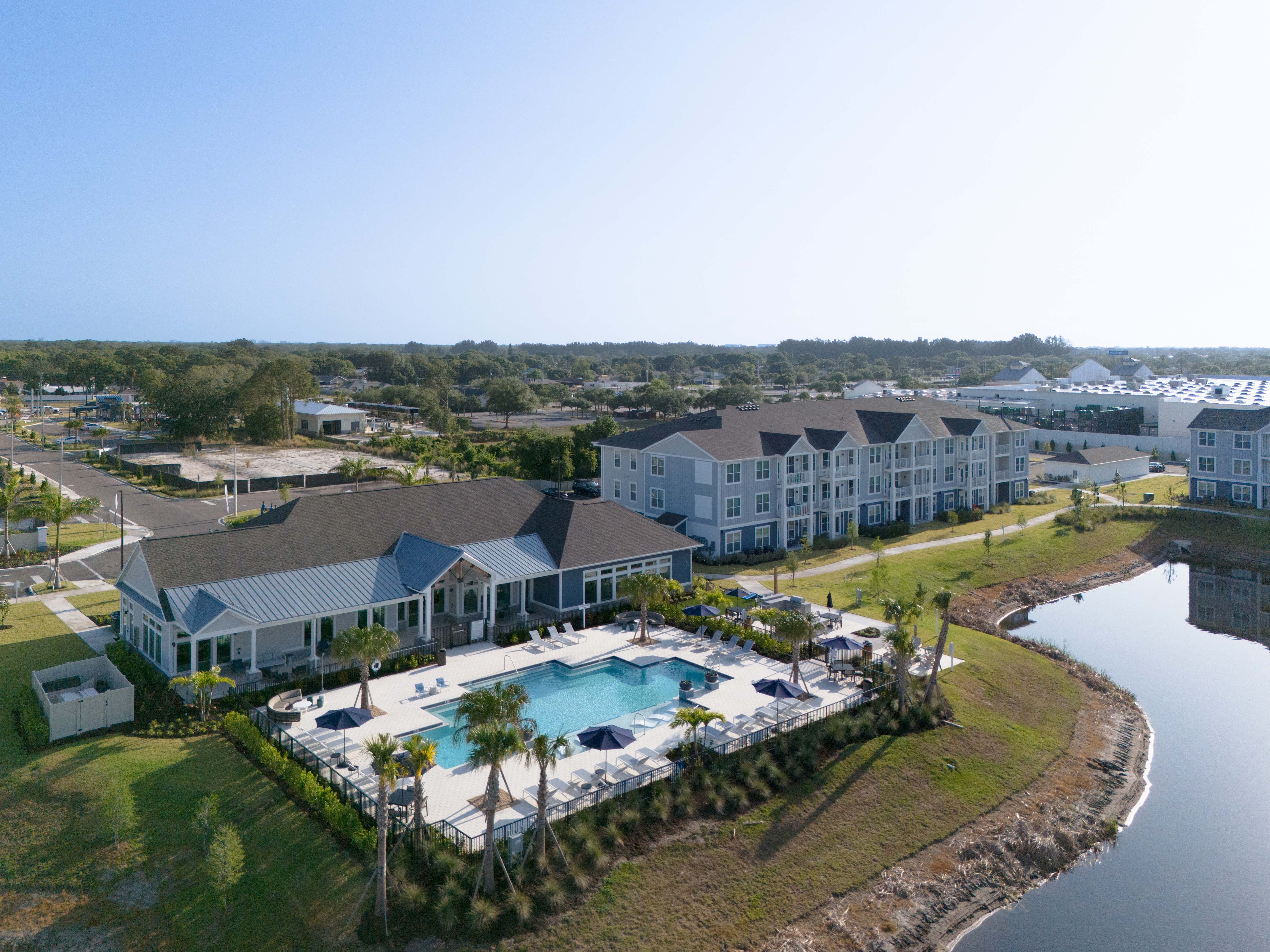 an aerial view of the resort with a swimming pool