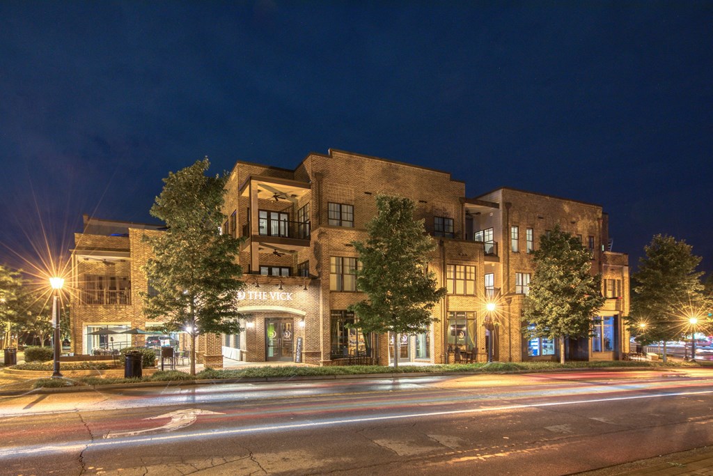 a city at night with a blue sky