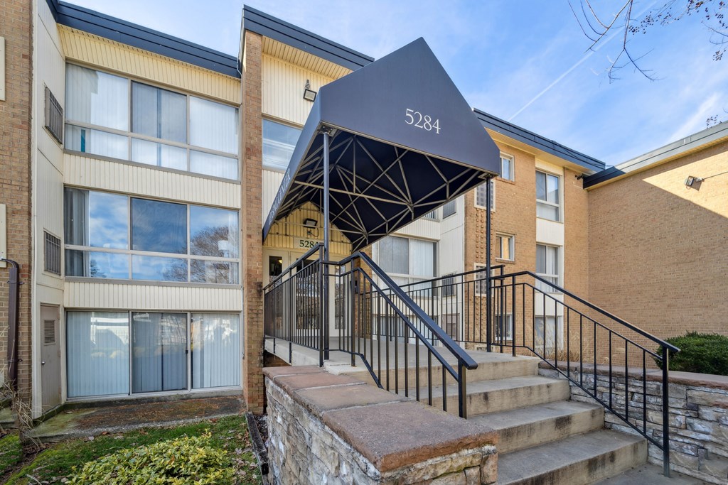 the entrance to a building with stairs and a black staircase at Capitol Heights, Capitol Heights, Maryland