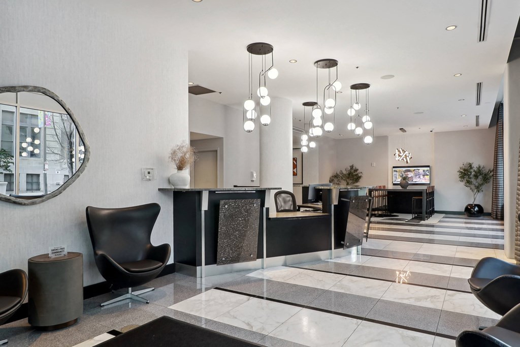 the lobby with chairs and a reception deskat The Zenith, Baltimore, MD, 21201