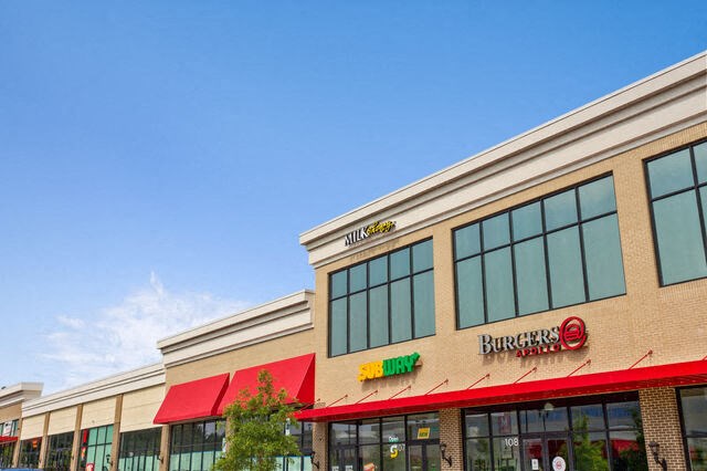 a building with a burger king sign on it at Aspire Apollo, Camp Springs, 20746