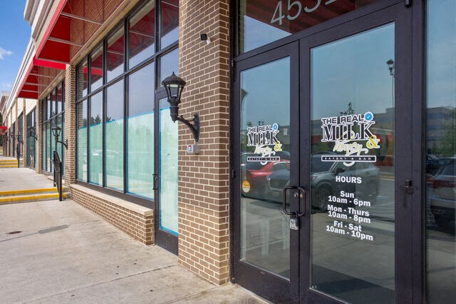 a view of the front of the building from the sidewalk at Aspire Apollo, Camp Springs, Maryland