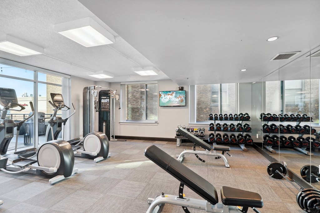 a fitness center with machines and weights at The Zenith, Baltimore, 21201