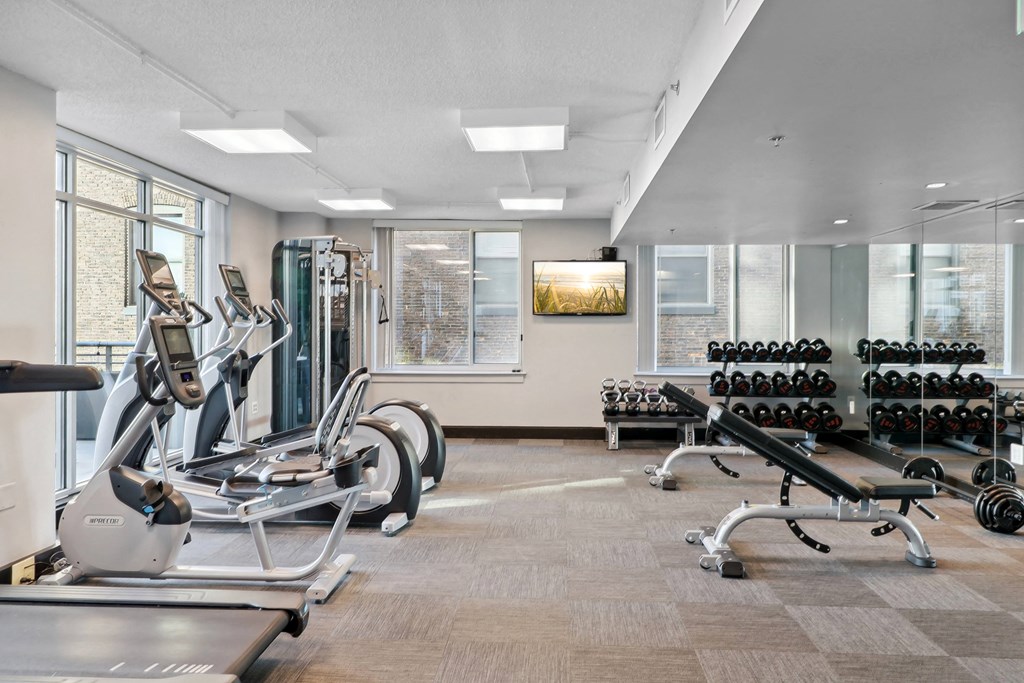 a fitness center with machines and weights at The Zenith, Baltimore, 21201