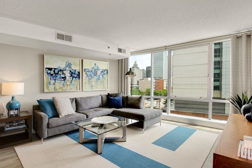 Open living area Open living area with floor to ceiling windows at The Zenith, Baltimore