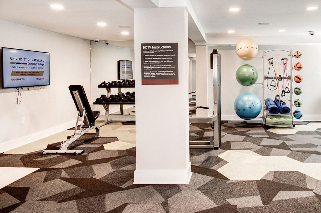 a view of the fitness center with weights and other exercise equipment at Hamilton at Kings Place, Columbia City