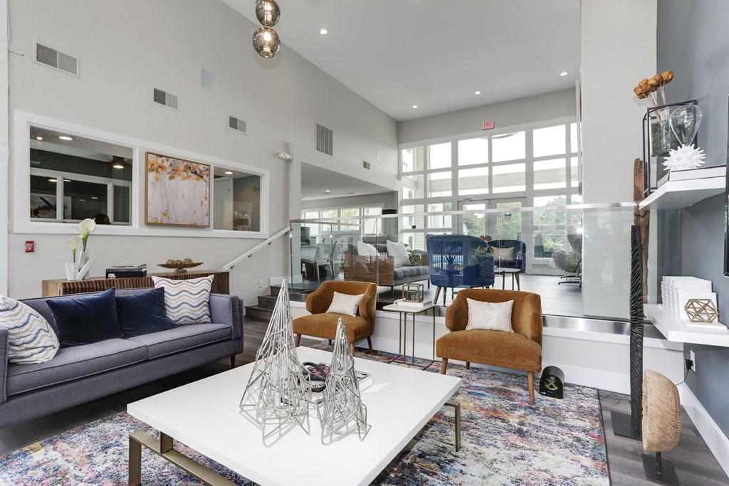 a spacious living room with a coffee table at Madison at Eden Brook, Columbia, MD 21046