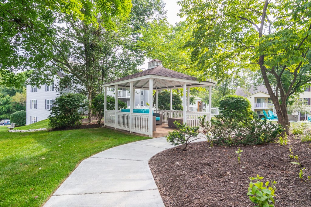 a gazebo in a backyard with a hot tub at Hamilton at Kings Place, Columbia Maryland