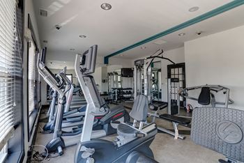 a gym with treadmills and other exercise equipment at Ellicott Grove, Maryland