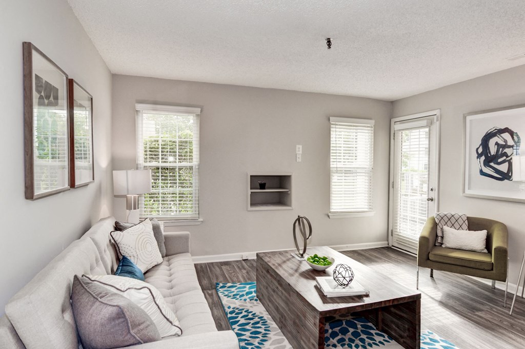 a living room with a couch and a coffee table at Hamilton at Kings Place, Maryland