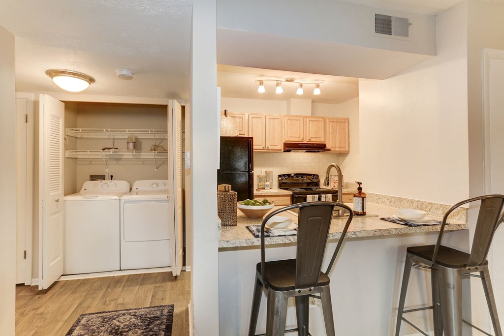a kitchen and dining area at Madison at Eden Brook, Columbia, MD 21046