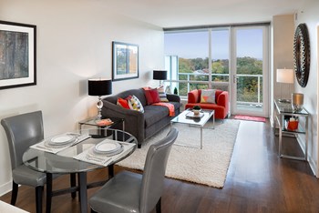 Living Room With Dining Area View Living Room With Dining Area View at Verde Pointe, Arlington, 22201 - Photo Gallery 2
