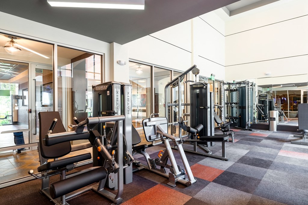 a gym with a variety of exercise equipment